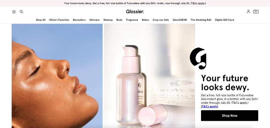 Glossier homepage featuring a model with dewy skin and a bottle of Futuredew skincare product, emphasizing beauty and skincare marketing strategies.